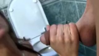 Stunning brunette teen likes it on the toilet